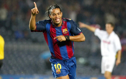 Blog Storytelling : The Smile That Changed Football: Ronaldinho Gaúcho's Gift to the Game at GoVintageJersey Store